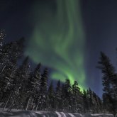 Romantische Nordlicht-Jagd von Kakslauttanen